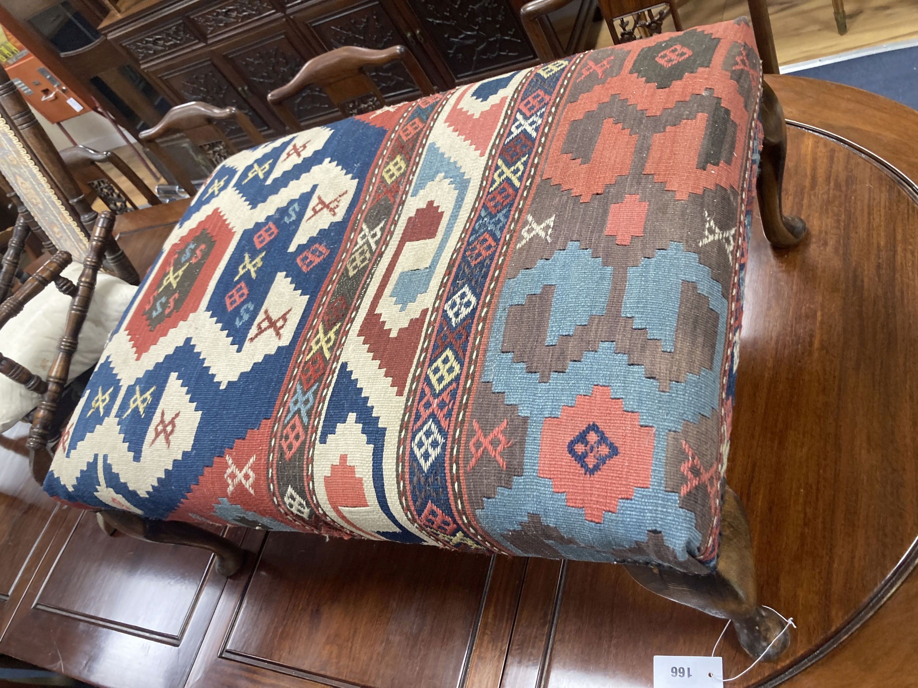 A large rectangular Kelim covered footstool, length 81cm, depth 55cm, height 36cm